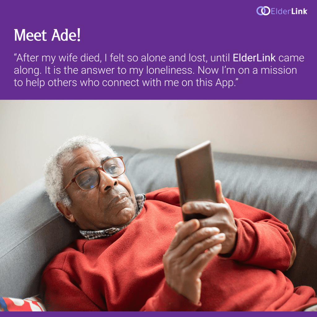 An elderly man lying on his couch and looking at his phone